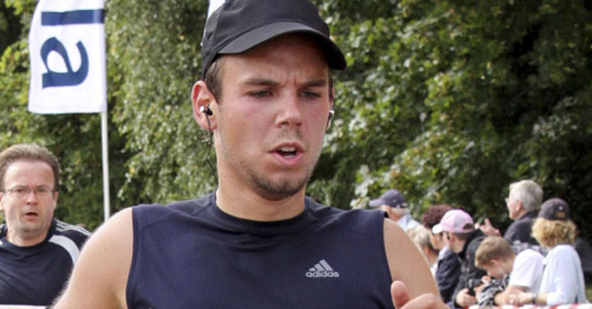 In this Sunday, Sept. 13, 2009 photo Andreas Lubitz competes at the Airportrun in Hamburg, northern Germany. Germanwings co-pilot Andreas Lubitz appears to have hidden evidence of an illness from his employers, including having been excused by a doctor from work the day he crashed a passenger plane into a mountain, prosecutors said Friday, March 27, 2015.  The evidence came from the search of Lubitz's homes in two German cities for an explanation of why he crashed the Airbus A320 into the French Alps, killing all 150 people on board. (AP Photo/Michael Mueller)